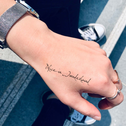 Alice in Wonderland custom temporary tattoo sticker design idea inspiration meanings removal arm wrist hand words font name signature calligraphy lyrics tour concert outfits merch accessory gift souvenir costumes wear dress up code