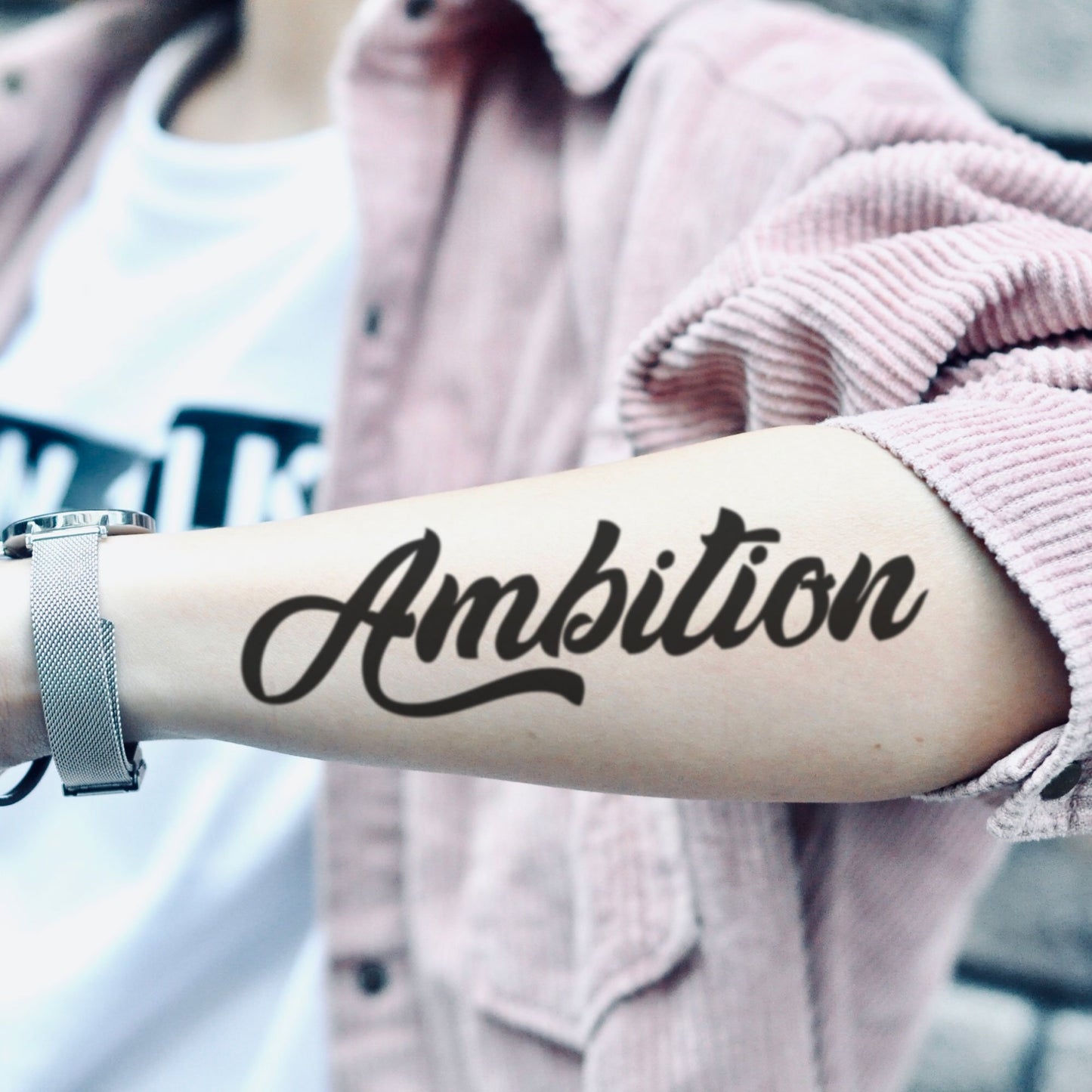 fake medium ambition ambitious cursive script lettering temporary tattoo sticker design idea on forearm