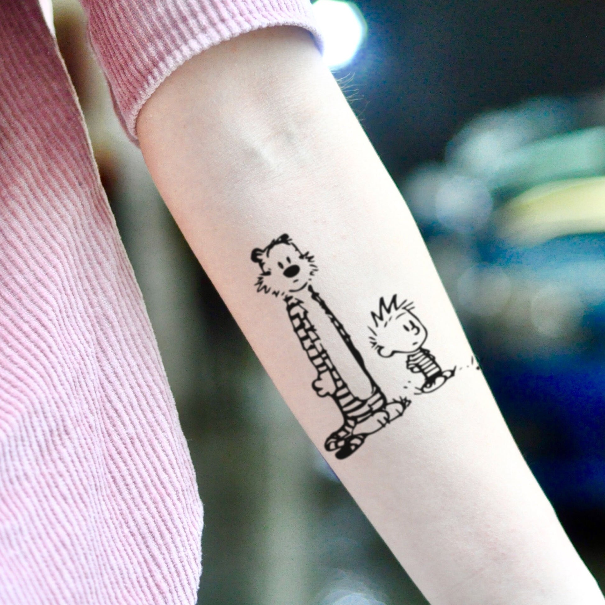 fake medium calvin and hobbes cartoon character cartoon temporary tattoo sticker design idea on inner arm