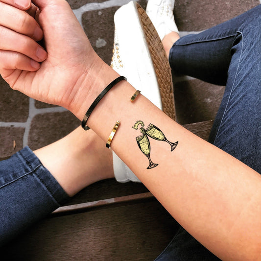 fake small champagne food color temporary tattoo sticker design idea on wrist