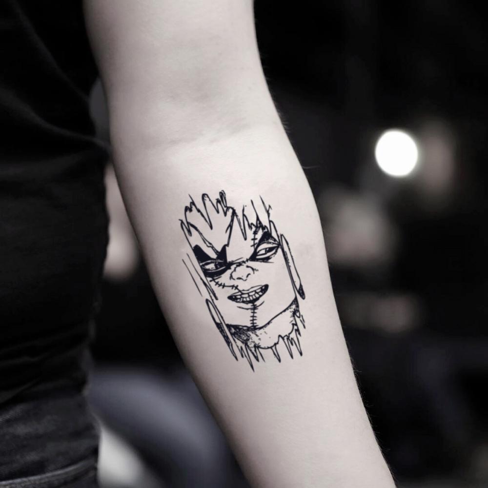 fake small chucky cartoon temporary tattoo sticker design idea on inner arm