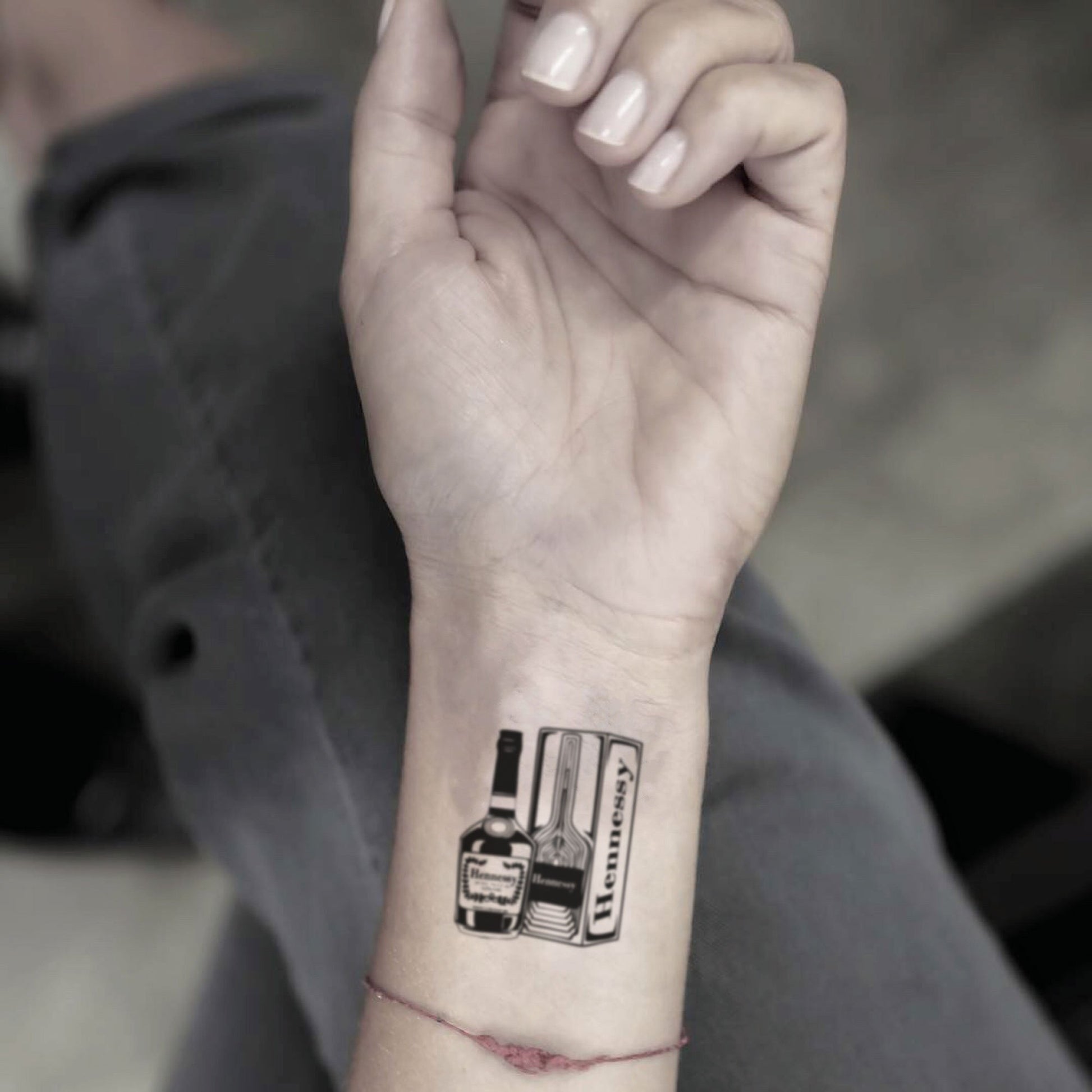 fake small hennessy bottle food temporary tattoo sticker design idea on wrist