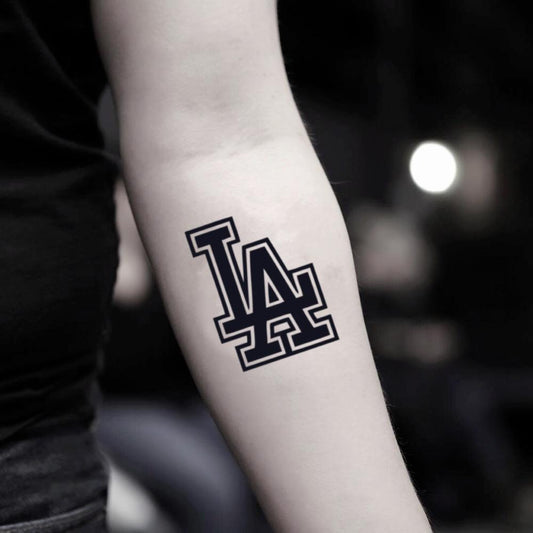 fake small la dodgers lettering temporary tattoo sticker design idea on inner arm