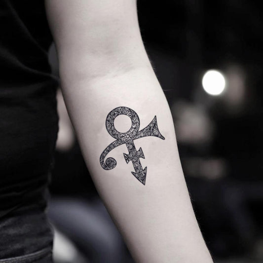 fake small prince symbol illustrative temporary tattoo sticker design idea on inner arm