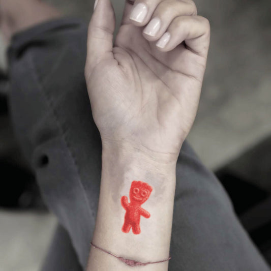 fake small sour patch kid red color candy food temporary tattoo sticker design idea on wrist