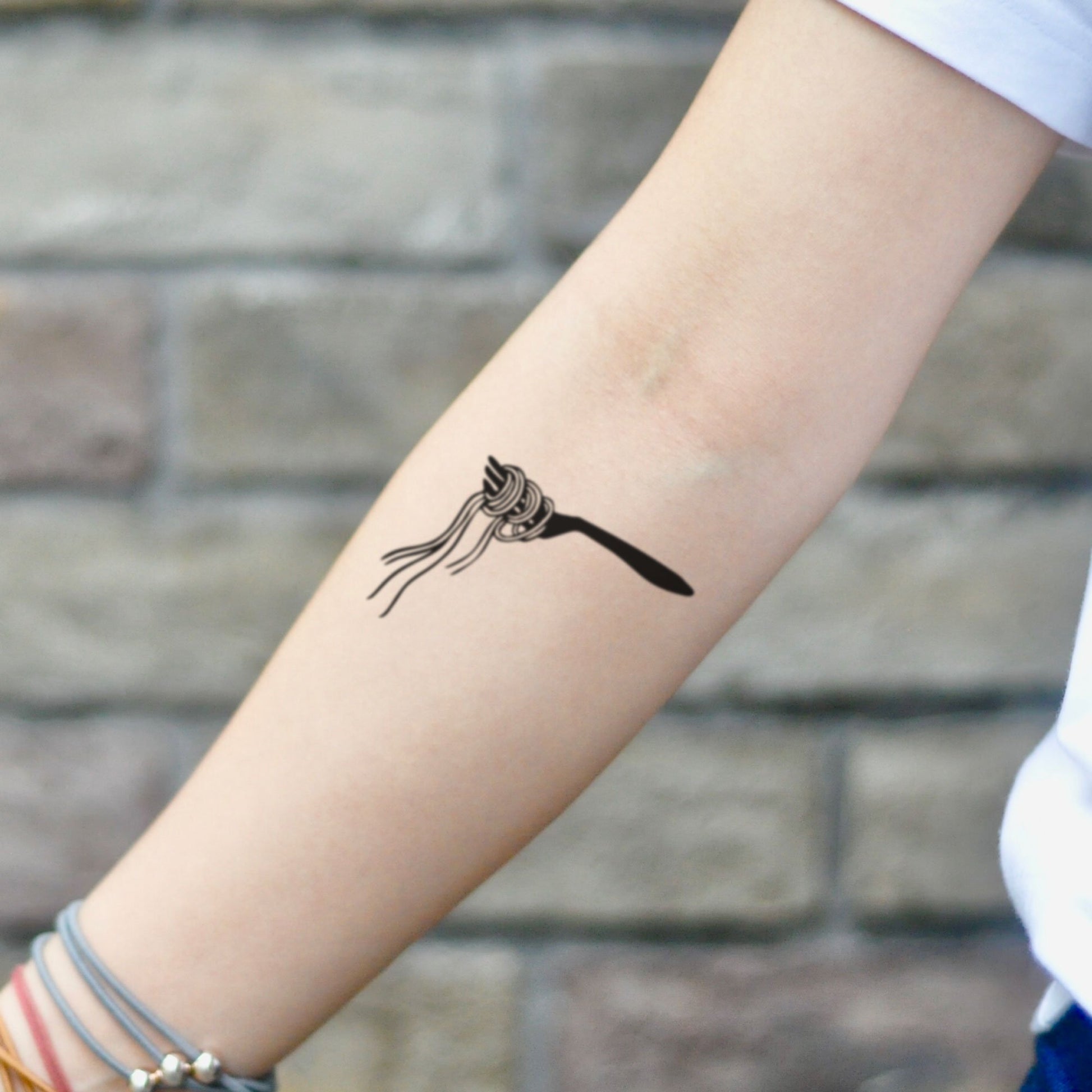 fake small spaghetti fork pasta food temporary tattoo sticker design idea on inner arm