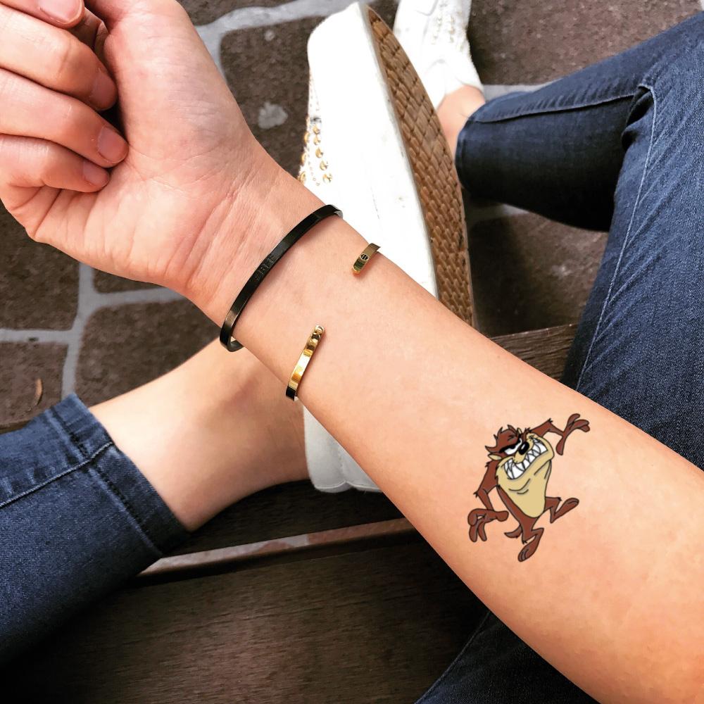 fake small taz tazz tasmanian devil cartoon temporary tattoo sticker design idea on forearm